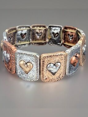Multi tone metal heart bohemian chic stretch bracelet